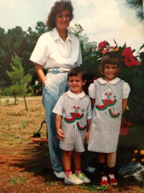 me and my brother with my mom (my brother and I are wearing matching outfits)