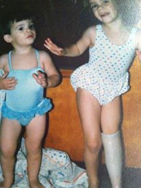 my brother and I wearing girl's swimsuits, ages 2 & 4 (guess)