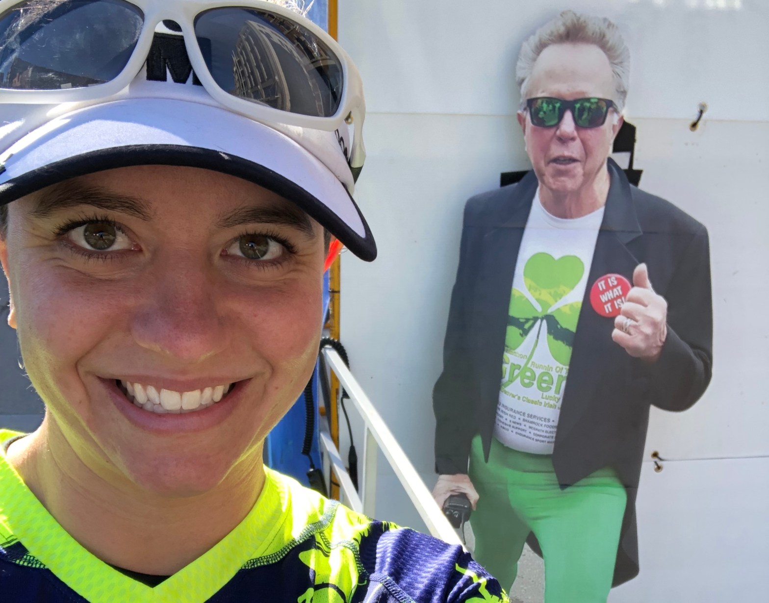 selfie of me with cutout of the founder of ROTG 7K, who is wearing green tights and a jacket